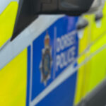 Two vehicle crash blocks road in Verwood
